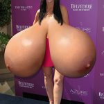 Jennifer L.H. letting her giant naked tits photographed