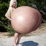 Beshine is about to break her back with her giant silicone tits